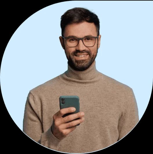 Smiling fintech expert using mobile
